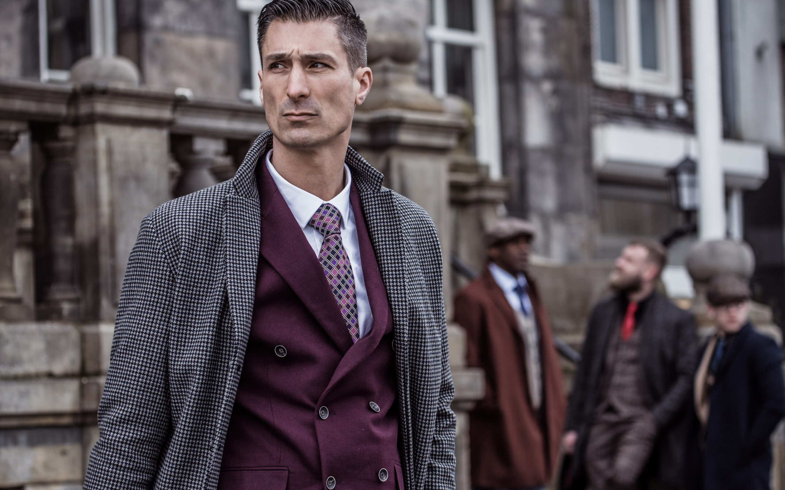 Group of vintage Gangster retrosexual people in an old city in the daytime